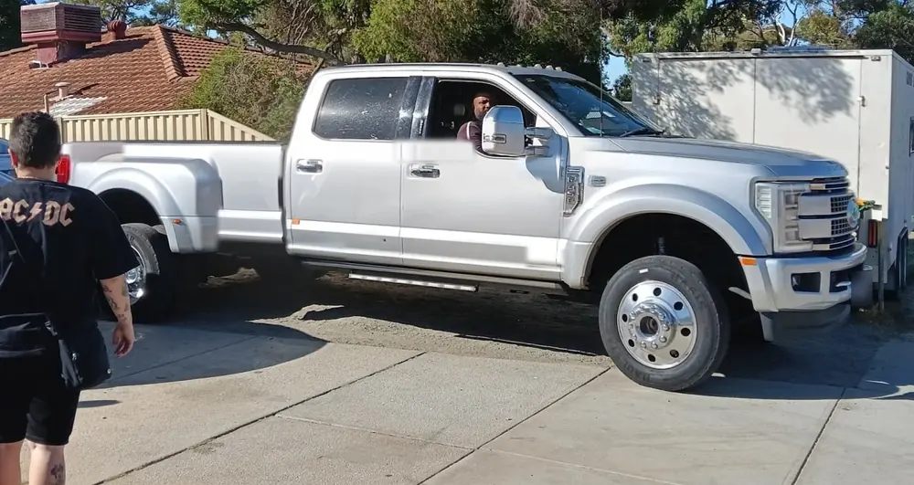 The Quokka Towing dual-wheel Ford arriving for a local tow in Malaga, driver at the wheel
