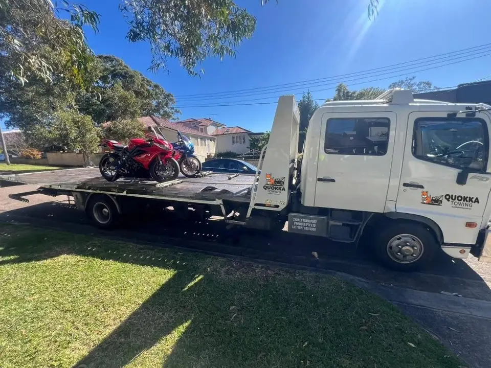 Two sports bikes strapped down on a Quokka Towing tilt tray